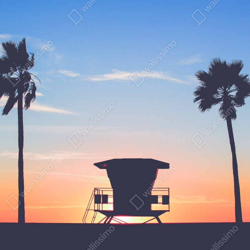 Fototapeta zachód słońca nad plażą z sylwetką wieży ratownika – Wallissimo® Fototapeta zachód słońca nad plażą z sylwetką wieży ratownika – Wallissimo®