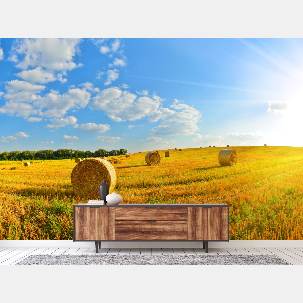Wall mural golden hayfield under blue sky
