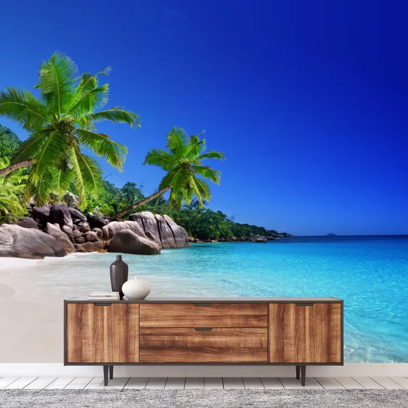 Fototapeta tropikalna plaża z turkusową wodą i palmami