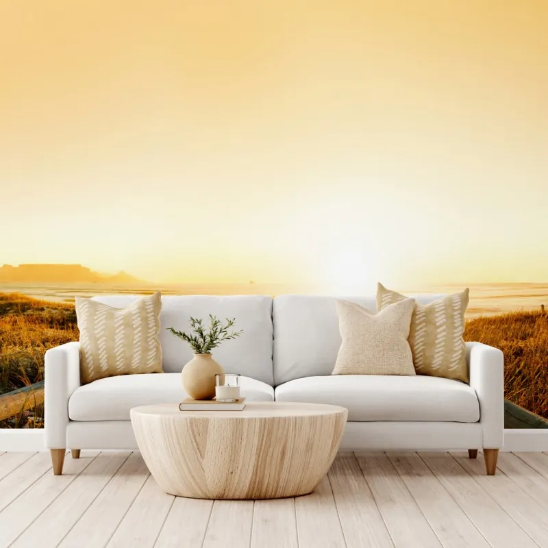 Fototapeta złota panorama zachodu słońca nad plażą z Górą Stołową