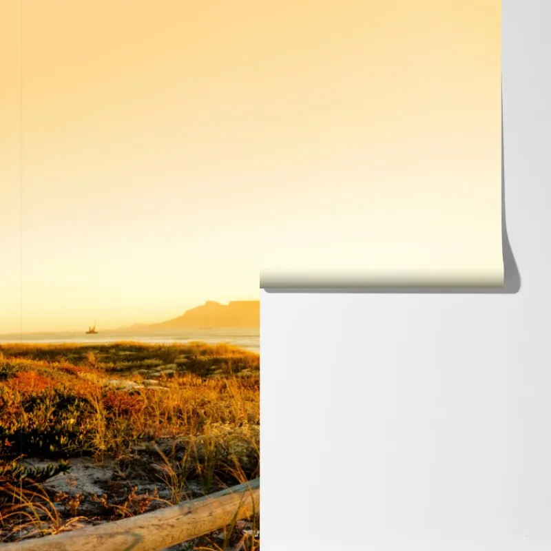 Fototapeta złota panorama zachodu słońca nad plażą z Górą Stołową – Wallissimo® Fototapeta złota panorama zachodu słońca nad plażą z Górą Stołową – Wallissimo®