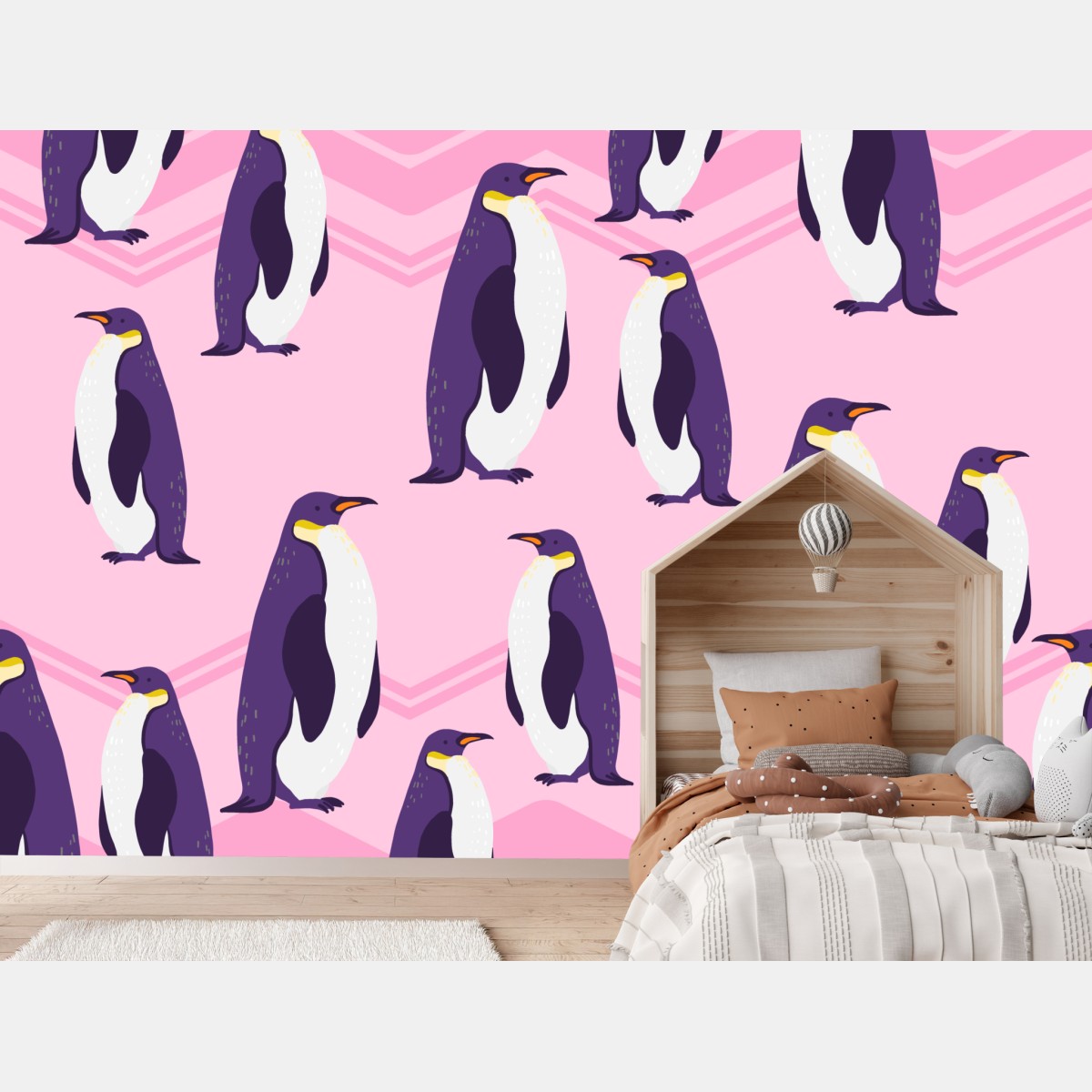 Wall mural playful purple penguin pattern on pink background