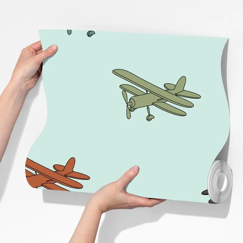 Fototapeta wzór z dwupłatowcami na turkusowym tle – Wallissimo® Fototapeta wzór z dwupłatowcami na turkusowym tle – Wallissimo®