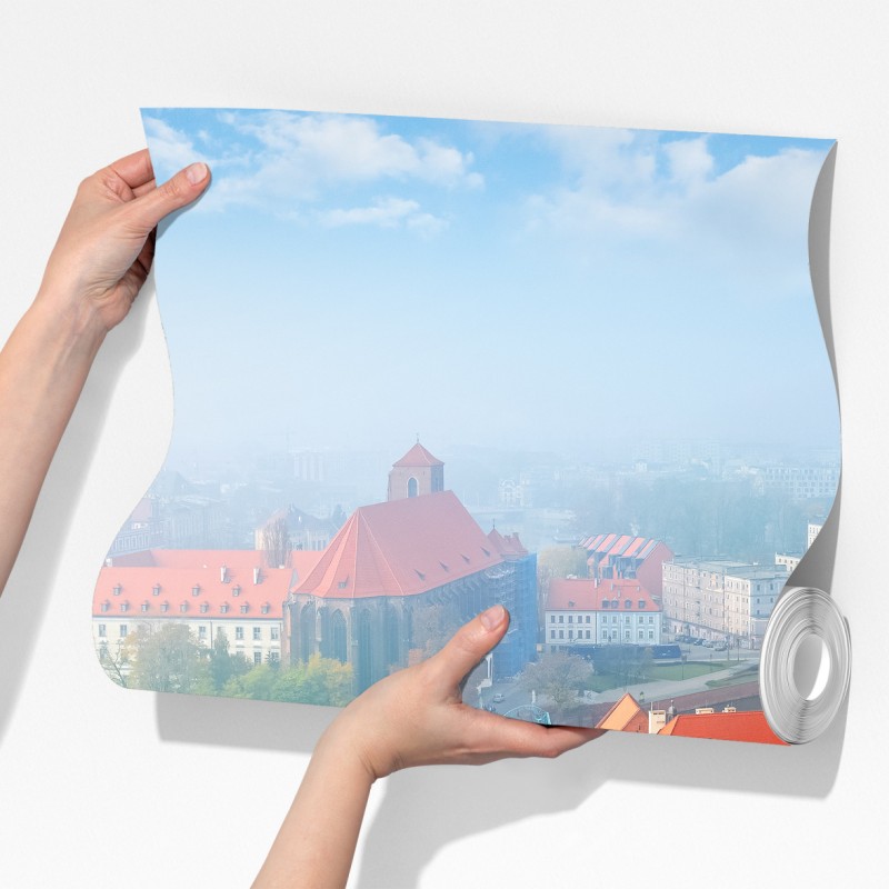 Fototapeta mglista panorama europejskiego miasta z czerwonymi dachami – Wallissimo® Fototapeta mglista panorama europejskiego miasta z czerwonymi dachami – Wallissimo®