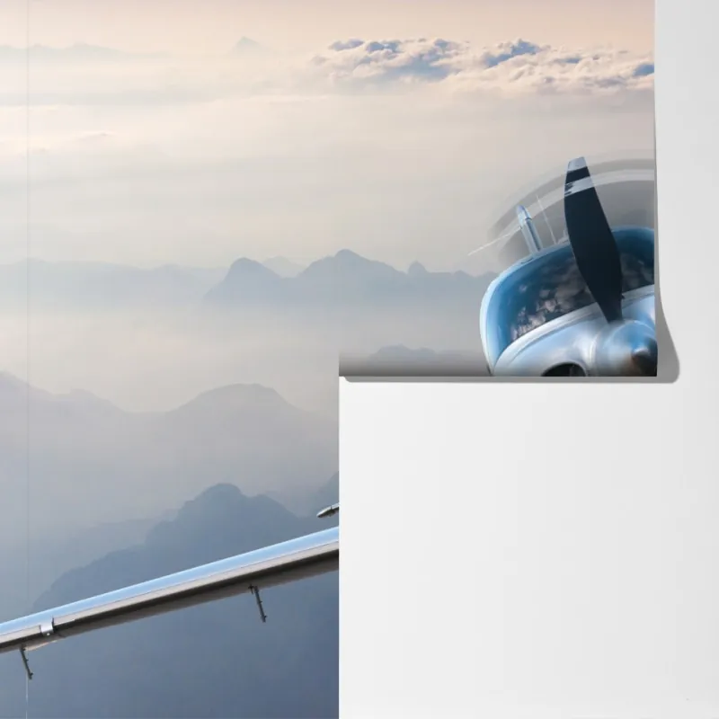 Fototapeta srebrny samolot śmigłowy nad mglistymi górami – Wallissimo® Fototapeta srebrny samolot śmigłowy nad mglistymi górami – Wallissimo®