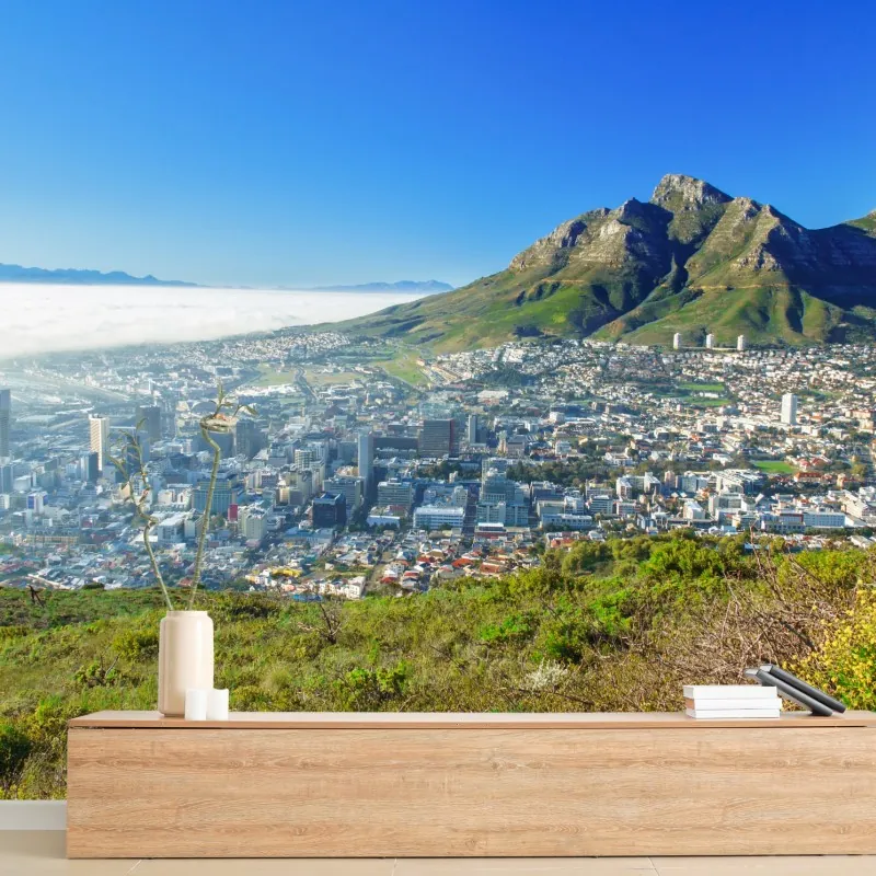 Fototapeta miejska panorama z górami i błękitnym niebem