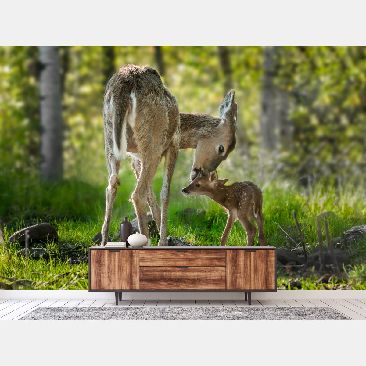 Wall mural mother deer and fawn in a sunlit forest