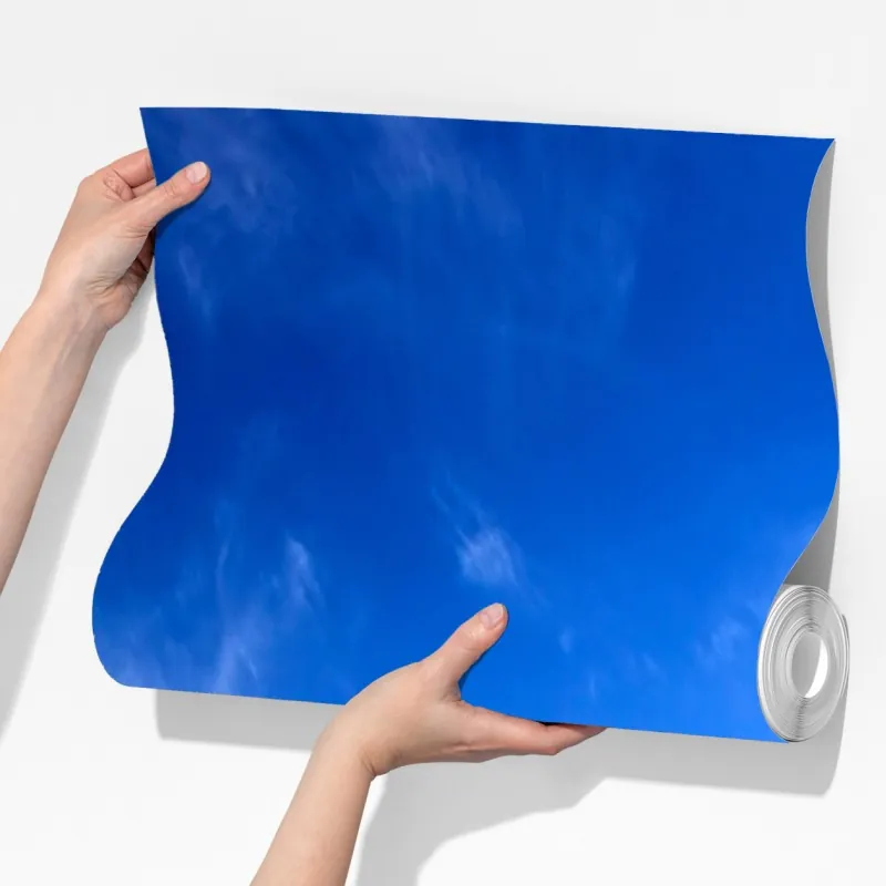 Fototapeta słoneczna zielona łąka pod niebieskim niebem – Wallissimo® Fototapeta słoneczna zielona łąka pod niebieskim niebem – Wallissimo®