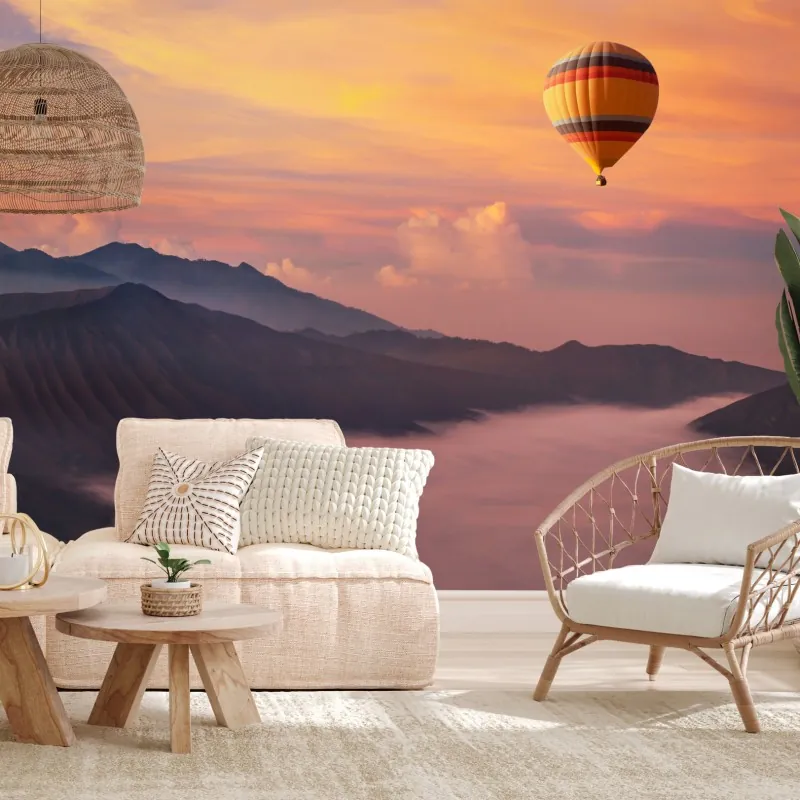 Fototapeta wschodzący balon nad mglistymi górami