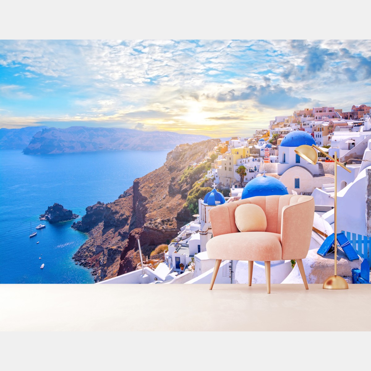 Wall mural sunlit Oia village on Santorini caldera