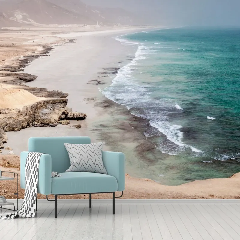 Fototapeta spokojne turkusowe wybrzeże nad pustynnymi klifami