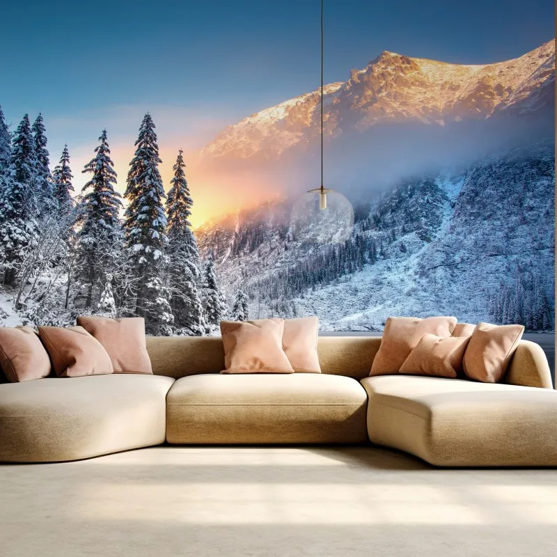 Fototapeta zima o wschodzie nad zaśnieżonym jeziorem górskim