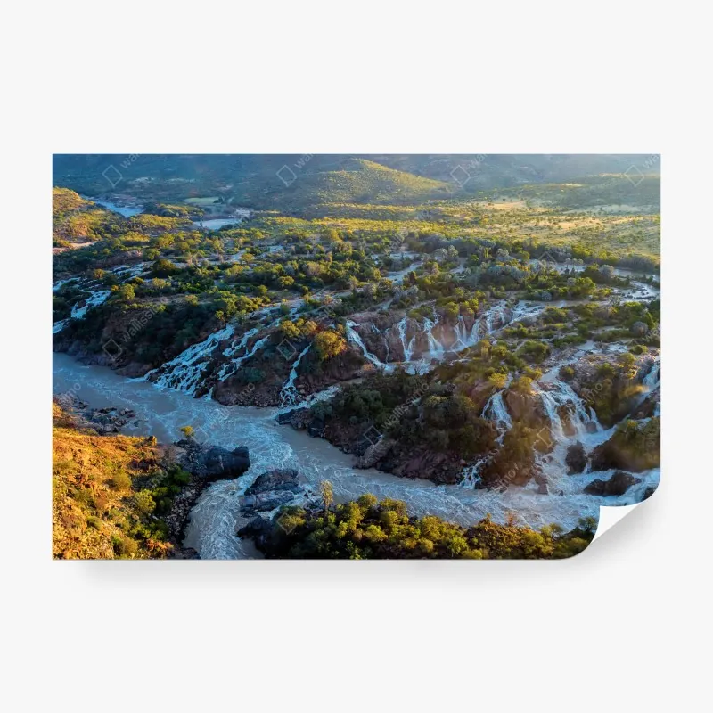 Fototapeta wschód słońca nad Epupa Falls i rzeką Kunene