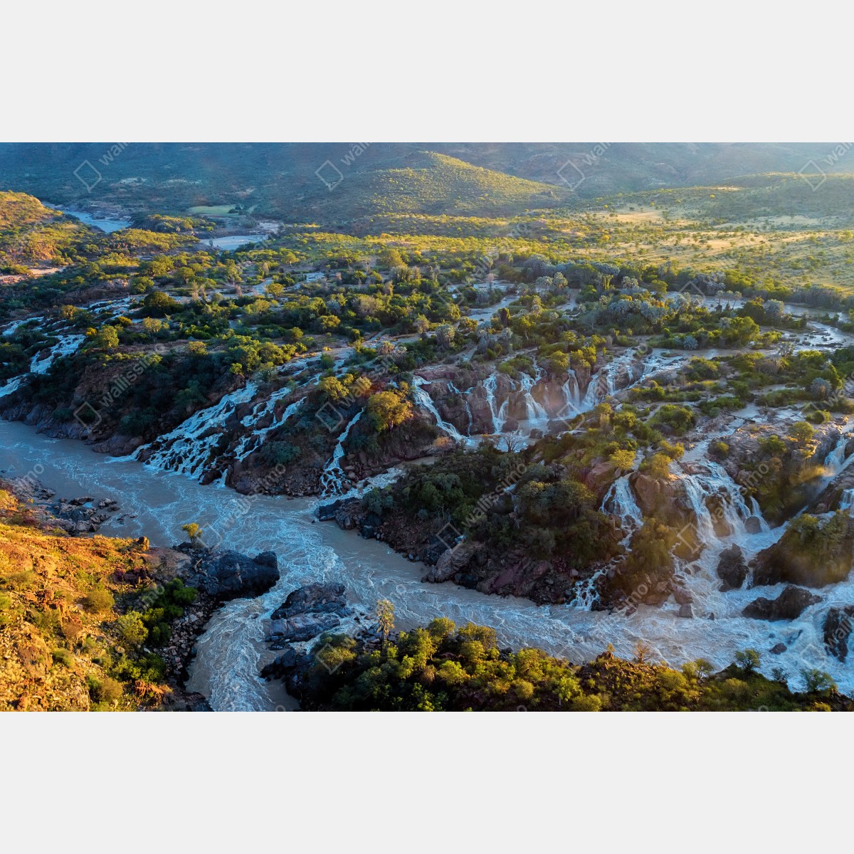 Fototapeta wschód słońca nad Epupa Falls i rzeką Kunene – Wallissimo® Fototapeta wschód słońca nad Epupa Falls i rzeką Kunene – Wallissimo®