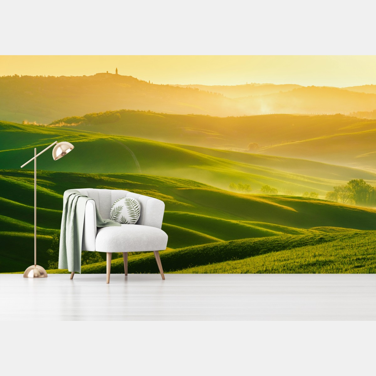 Wall mural golden sunrise over rolling green hills