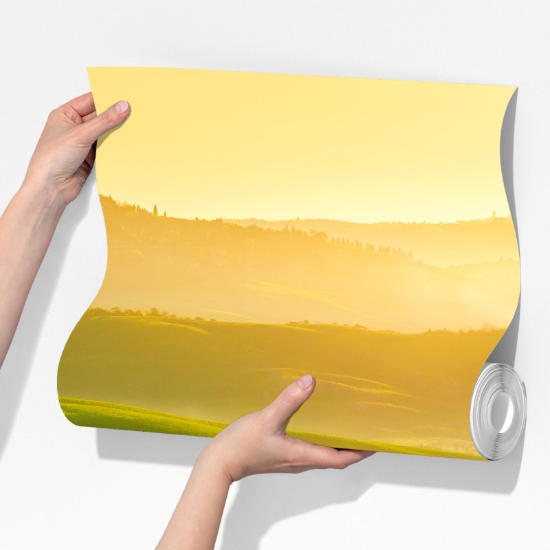 Fototapeta złoty wschód słońca nad zielonymi falującymi wzgórzami – Wallissimo® Fototapeta złoty wschód słońca nad zielonymi falującymi wzgórzami – Wallissimo®