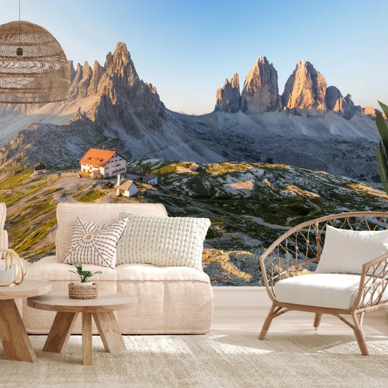 Fototapeta oświetlone słońcem schronisko w górach