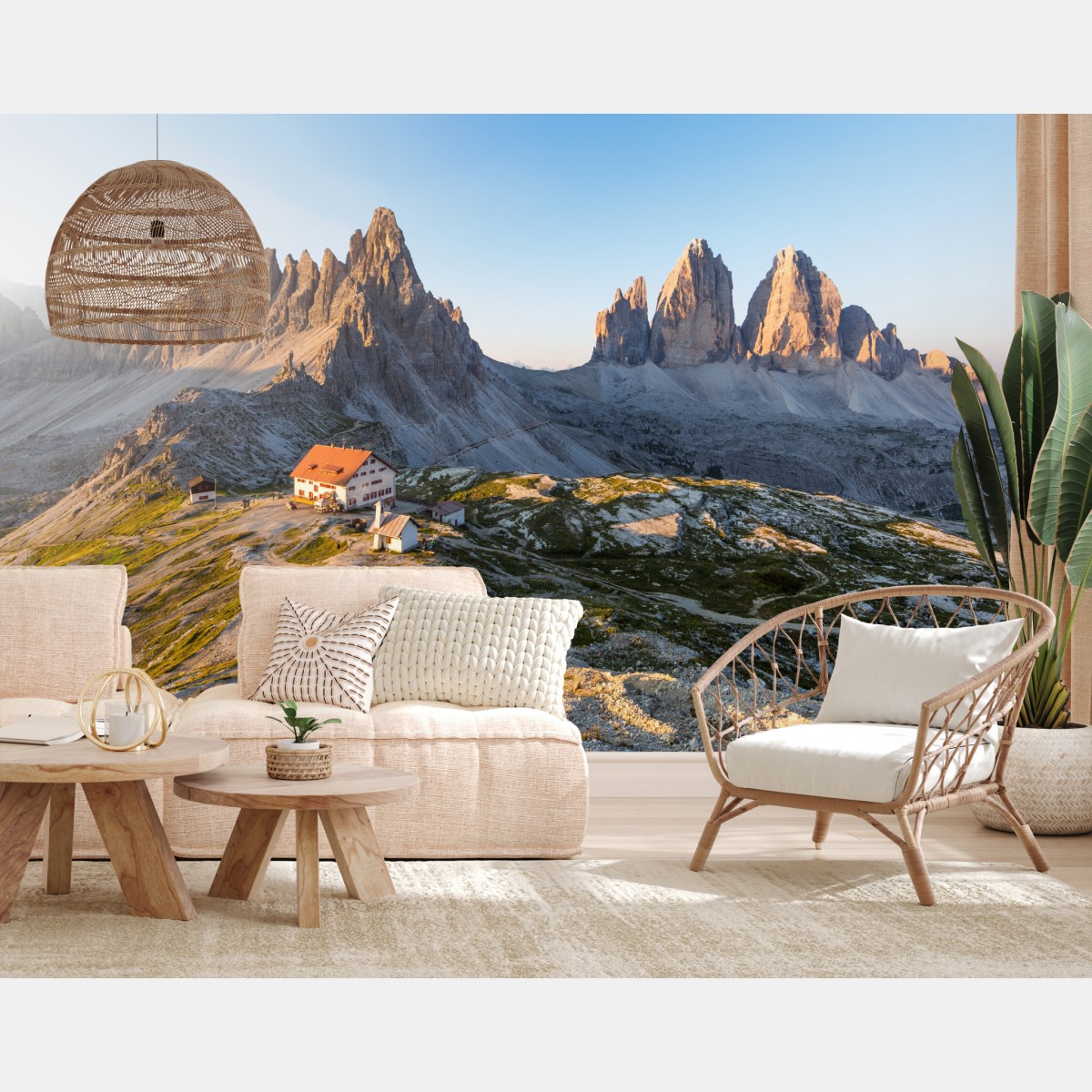 Wall mural sunlit mountain refuge at dawn