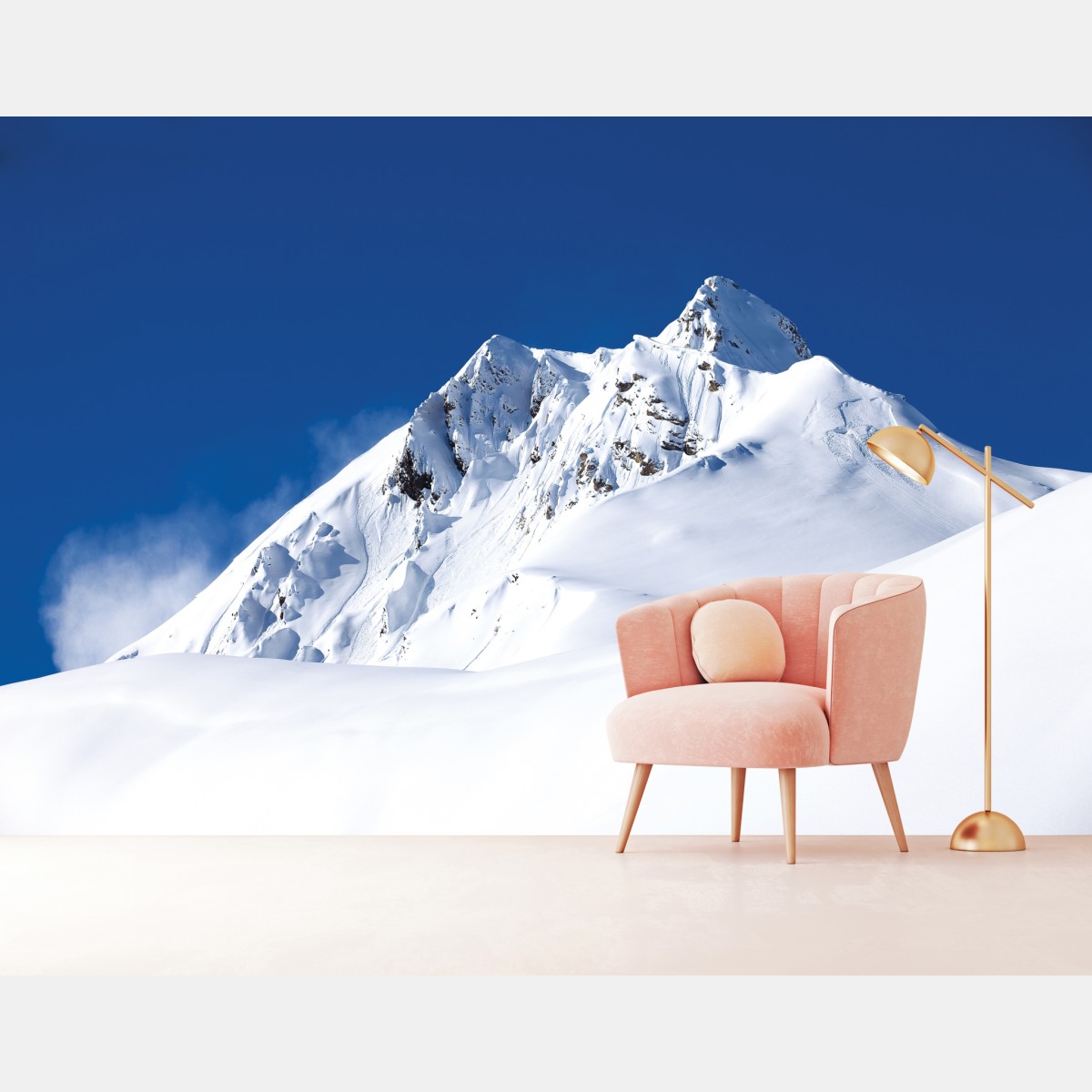Wall mural snow-covered alpine peak under deep blue sky