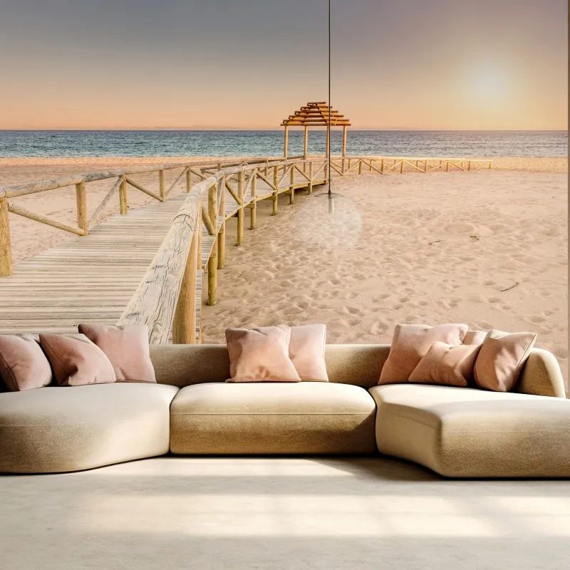 Fototapeta drewniany pomost na plaży Trafalgar o zachodzie słońca