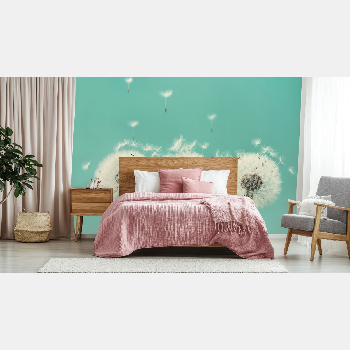 Wall mural three dandelion puffballs on turquoise background