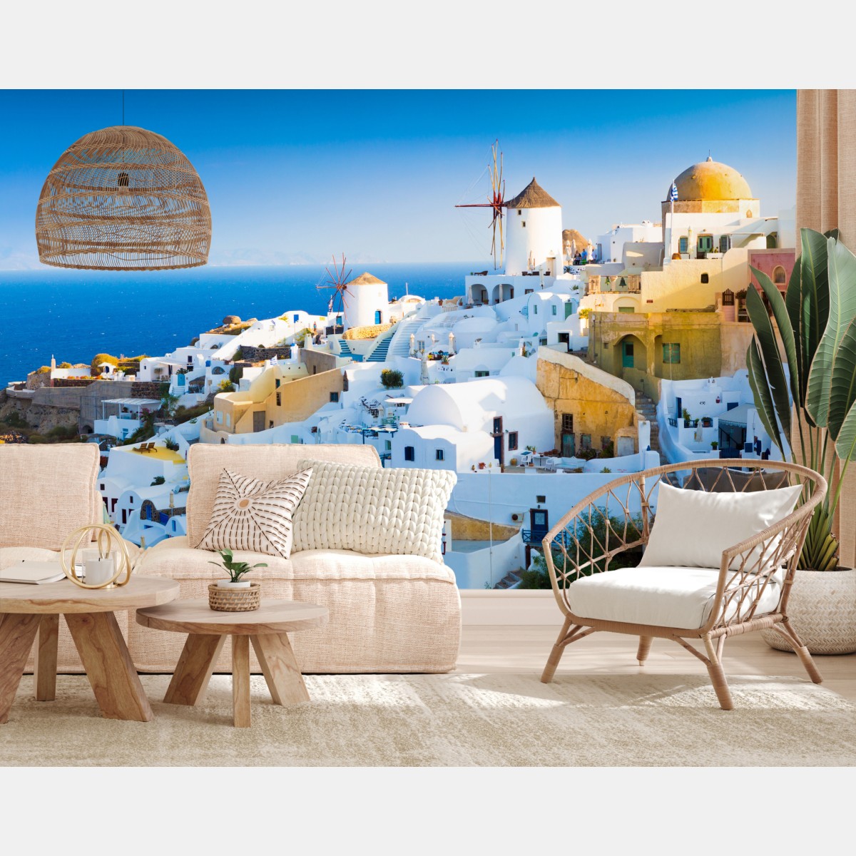 Wall mural sunlit Santorini village by the sea