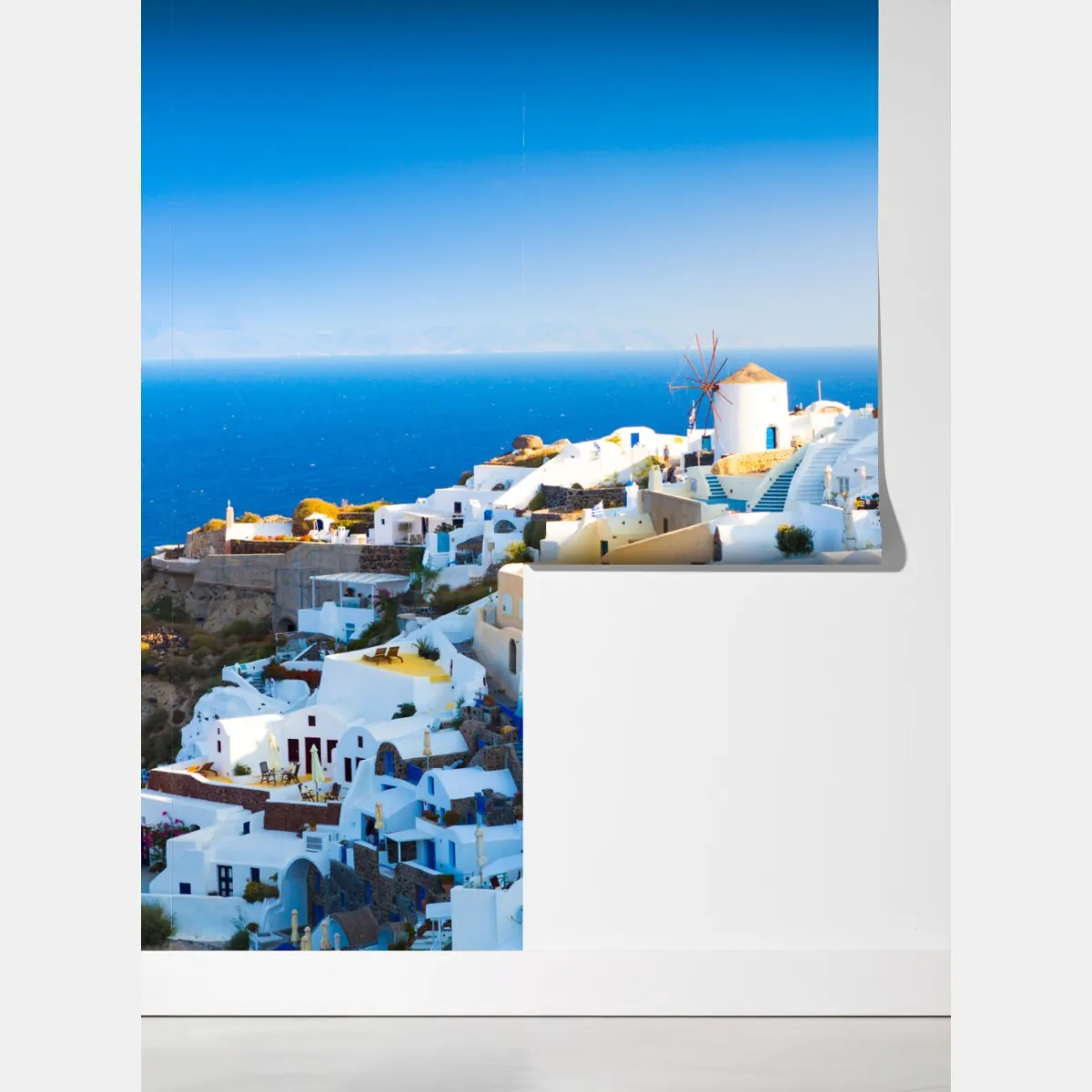 Fototapeta nasłonecznione miasteczko Santorini nad morzem – Wallissimo® Fototapeta nasłonecznione miasteczko Santorini nad morzem – Wallissimo®
