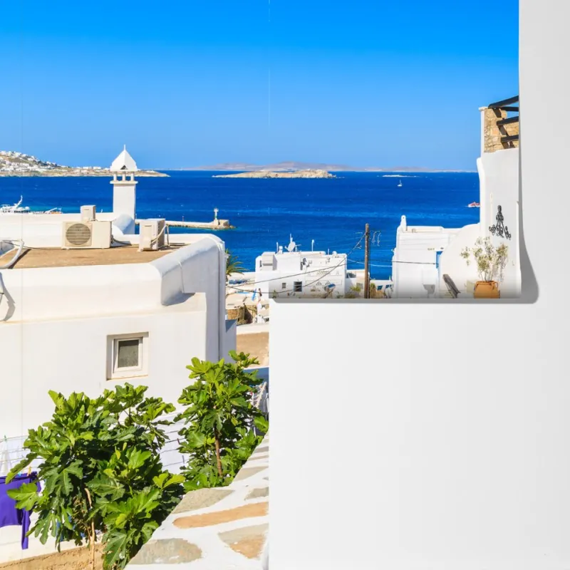 Fototapeta słoneczna uliczka w Mykonos – Wallissimo® Fototapeta słoneczna uliczka w Mykonos – Wallissimo®