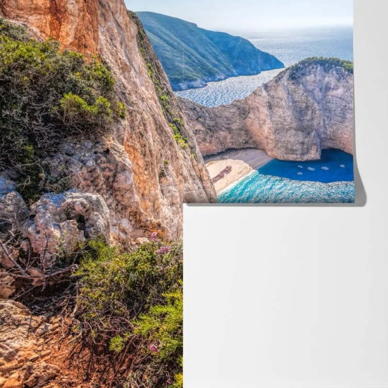 Fototapeta Navagio plaża o zachodzie słońca z turkusowym morzem i dzikimi kwiatami – Wallissimo® Fototapeta Navagio plaża o zachodzie słońca z turkusowym morzem i dzikimi kwiatami – Wallissimo®