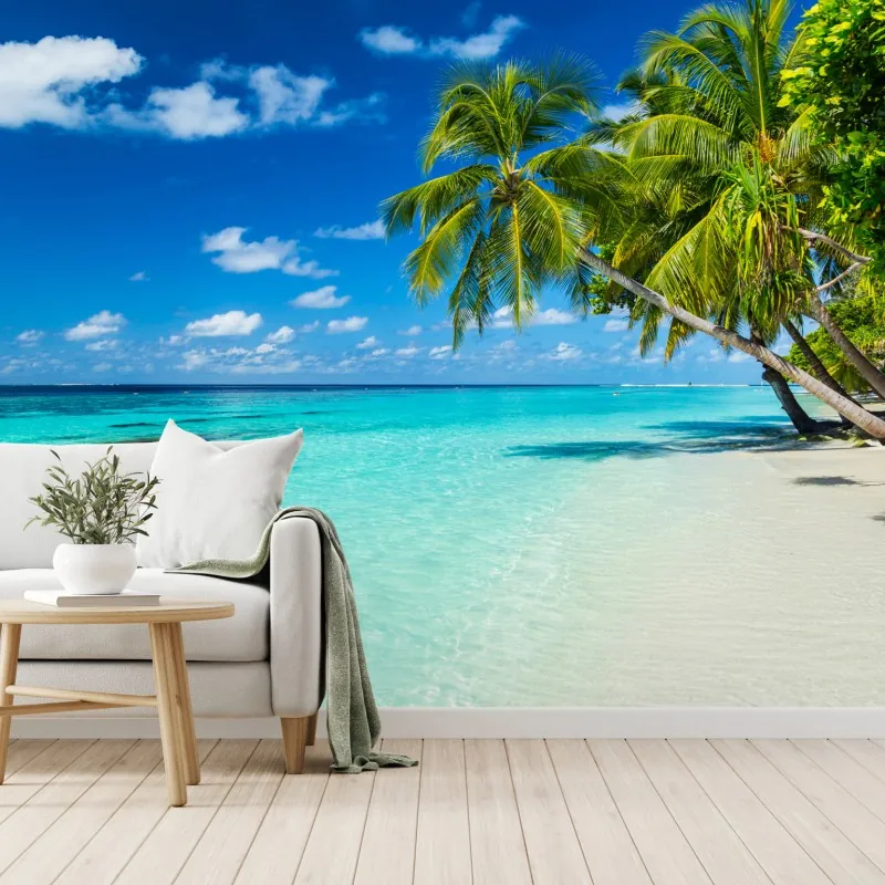 Fototapeta tropikalna turkusowa plaża z pochylonymi palmami