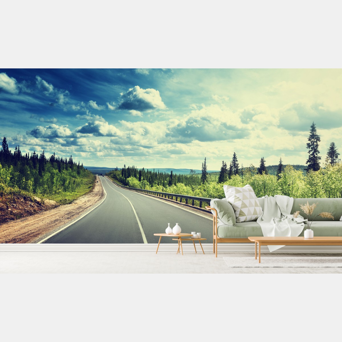 Wall mural sunlit forest road to the horizon