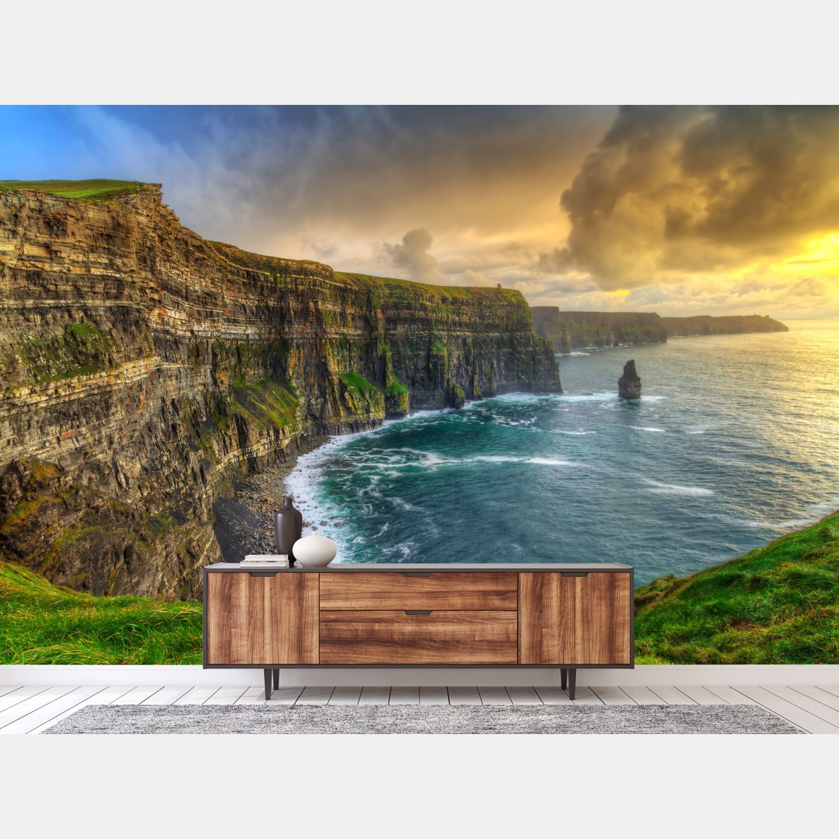Wall mural dramatic coastal cliffs at sunset