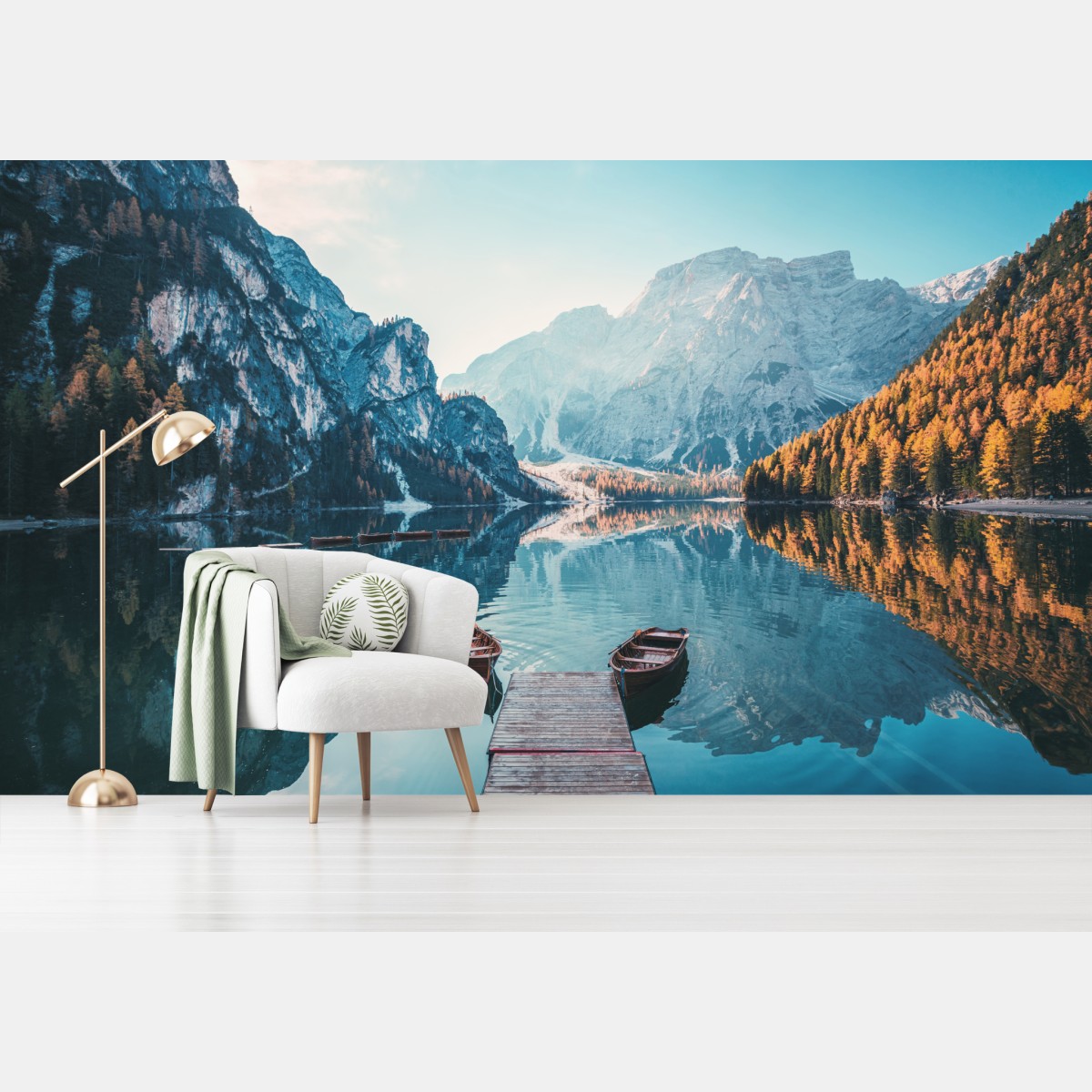Wall mural sunlit dock at Braies Lake, Dolomites