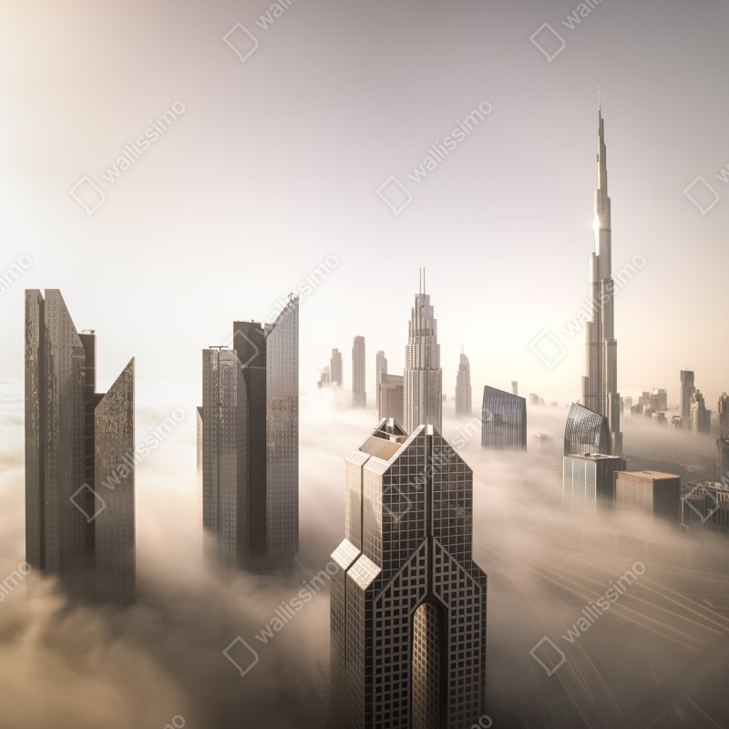 Fototapeta mglista panorama Dubaju nad chmurami – Wallissimo® Fototapeta mglista panorama Dubaju nad chmurami – Wallissimo®