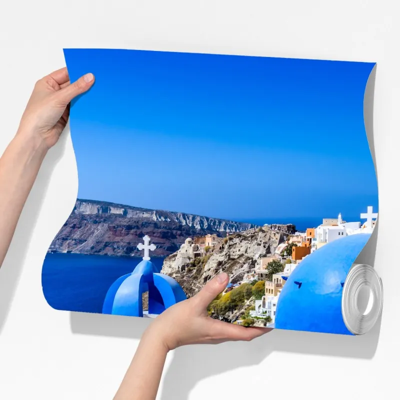 Fototapeta Santorini niebieskie kopuły nad kalderą – Wallissimo® Fototapeta Santorini niebieskie kopuły nad kalderą – Wallissimo®