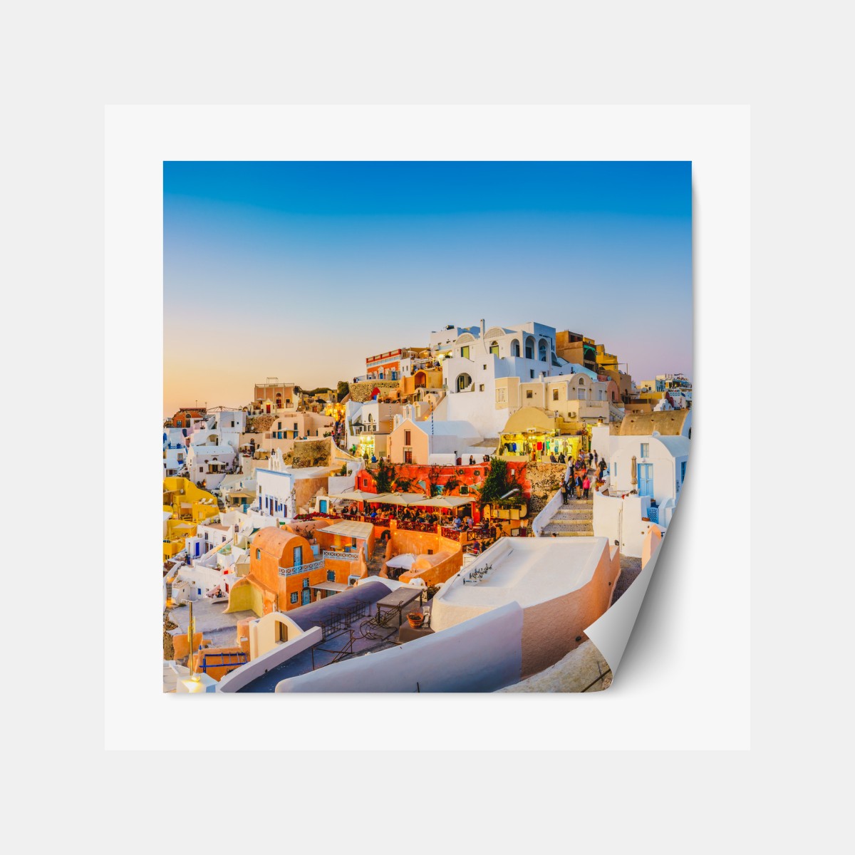 Repositionable sticker sunset over Santorini village panoramic view