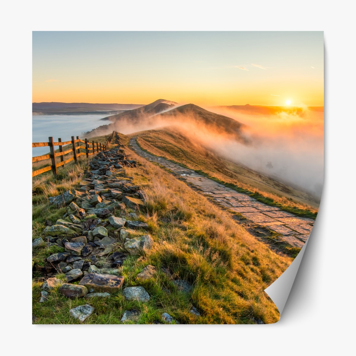 Repositionable sticker sunrise over a misty ridge with a stone path