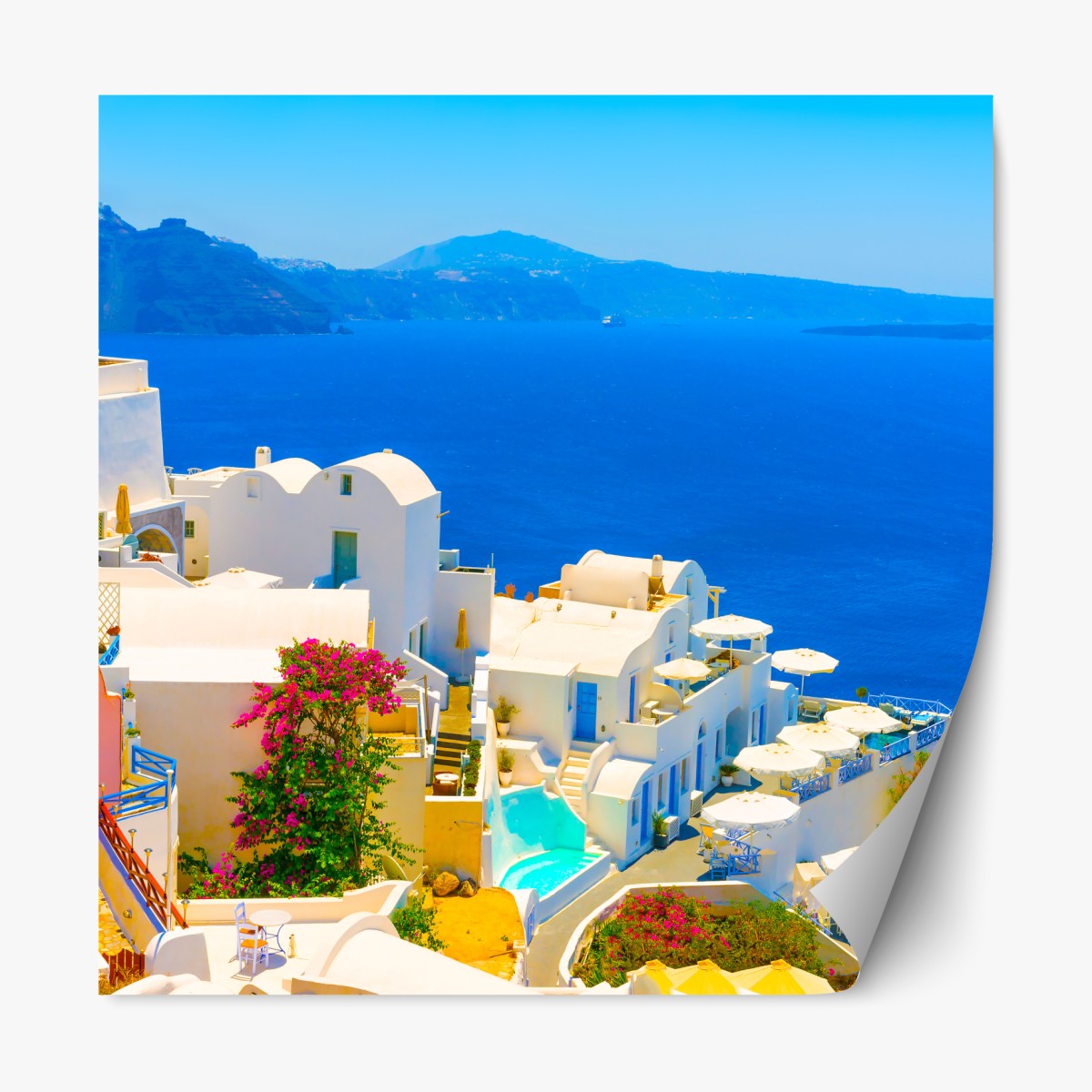 Repositionable sticker sunlit view of Santorini's white villas and blue sea