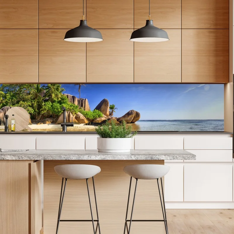 Naklejka repozycjonowalna tropikalna plaża z granitowymi głazami i klarowną wodą – Wallissimo® Naklejka repozycjonowalna tropikalna plaża z granitowymi głazami i klarowną wodą – Wallissimo®