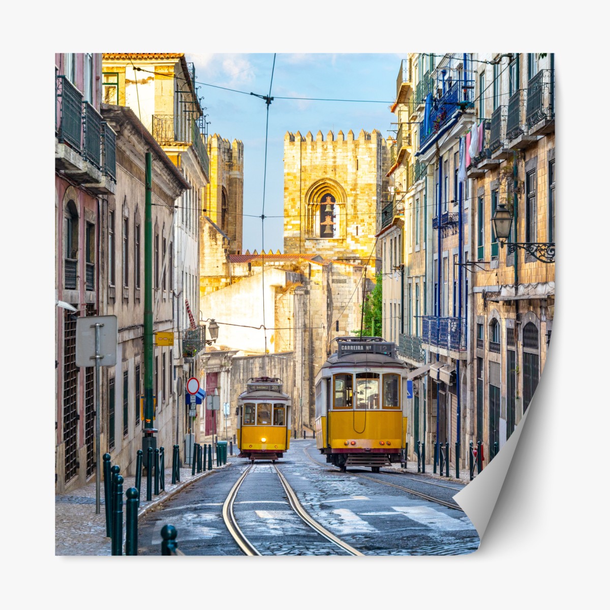Repositionable sticker sunlit trams on Lisbon's historic street