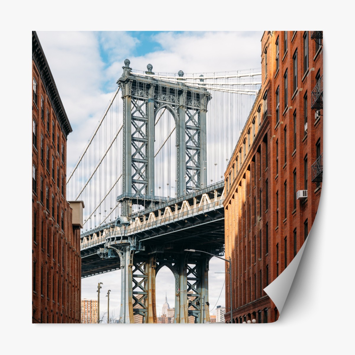 Repositionable sticker Brooklyn bridge framed by brick buildings at sunset