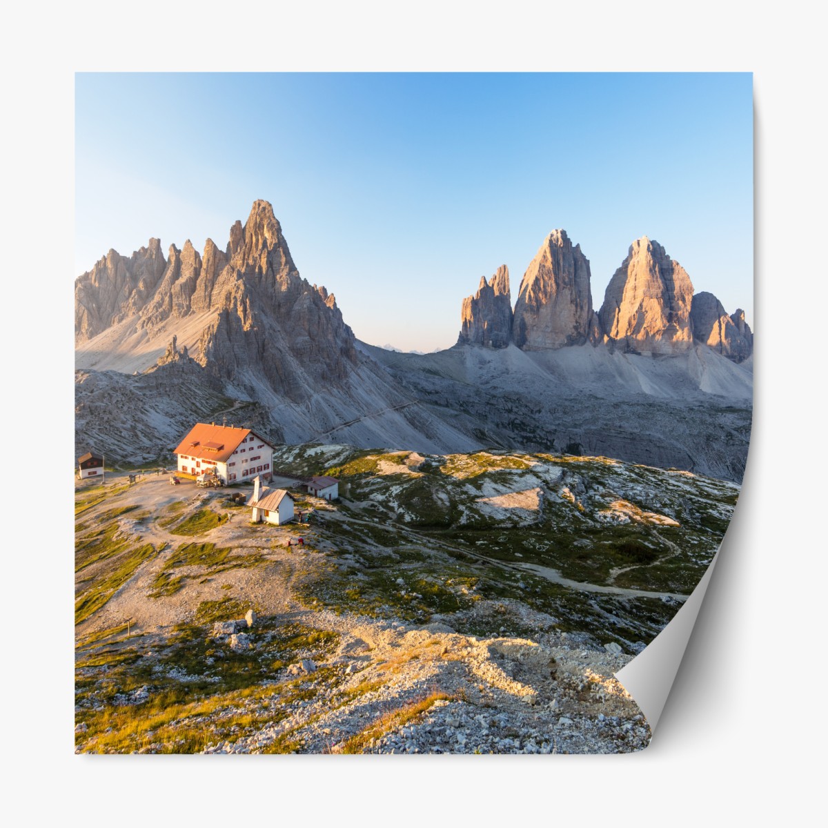 Repositionable sticker sunlit mountain refuge at dawn