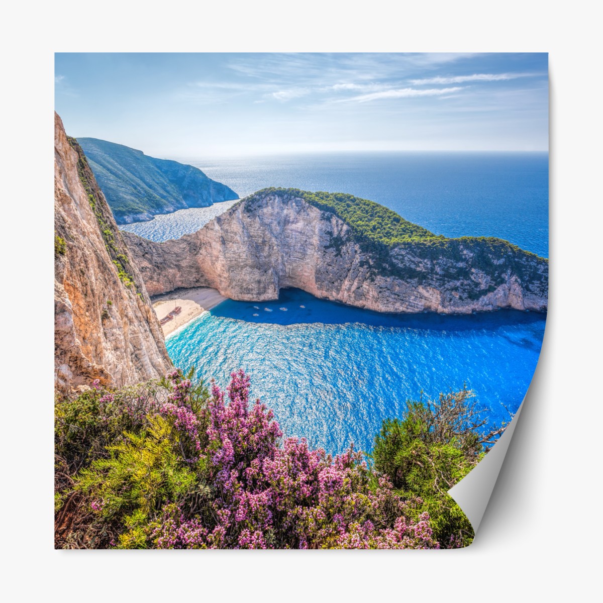 Repositionable sticker Navagio beach sunset with turquoise sea and wildflowers