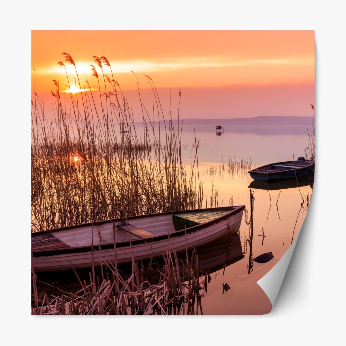 Repositionable sticker sunset at the lakeside with moored boats