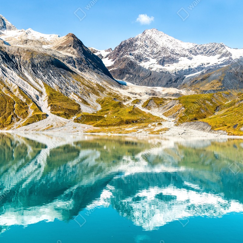 Naklejka repozycjonowalna spokojne alpejskie jezioro z ośnieżonymi szczytami – Wallissimo® Naklejka repozycjonowalna spokojne alpejskie jezioro z ośnieżonymi szczytami – Wallissimo®