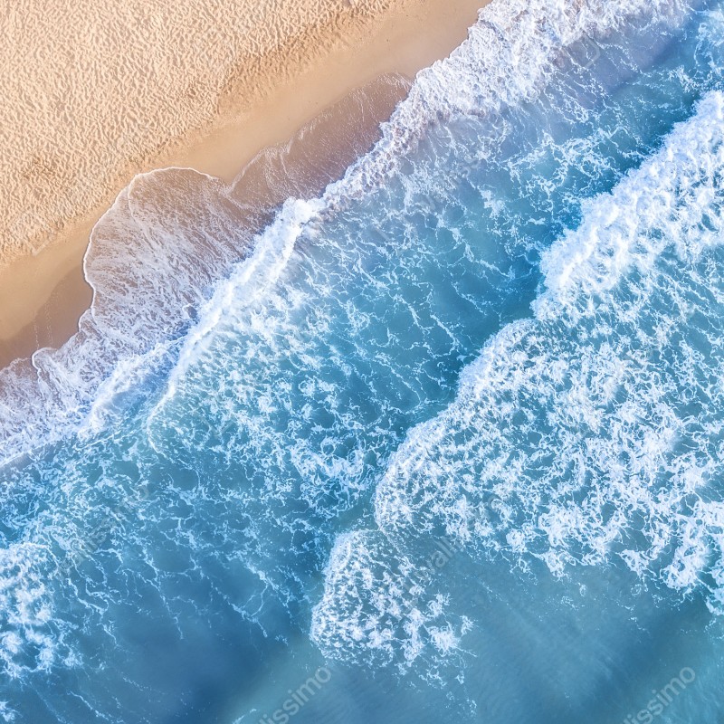 Naklejka na szafę widok z lotu ptaka na turkusowe fale i piaszczystą plażę – Wallissimo® Naklejka na szafę widok z lotu ptaka na turkusowe fale i piaszczystą plażę – Wallissimo®