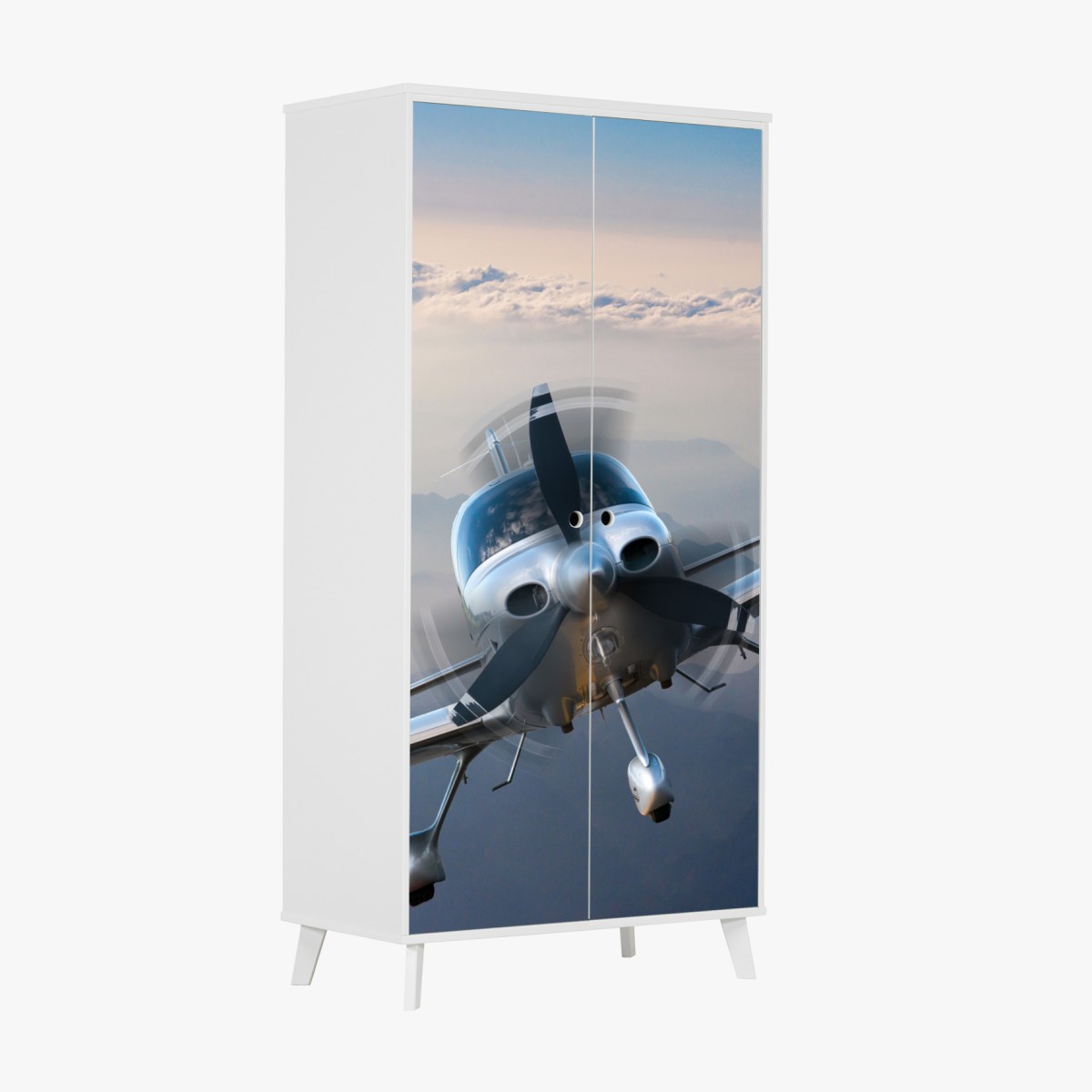 Wardrobe sticker silver propeller plane over misty mountains