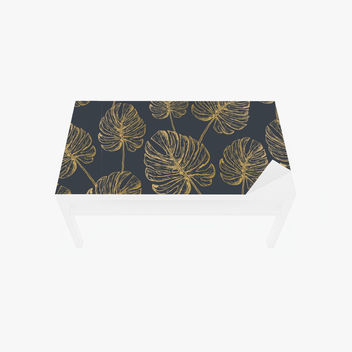 Table & desk veneer gold monstera leaves on dark background