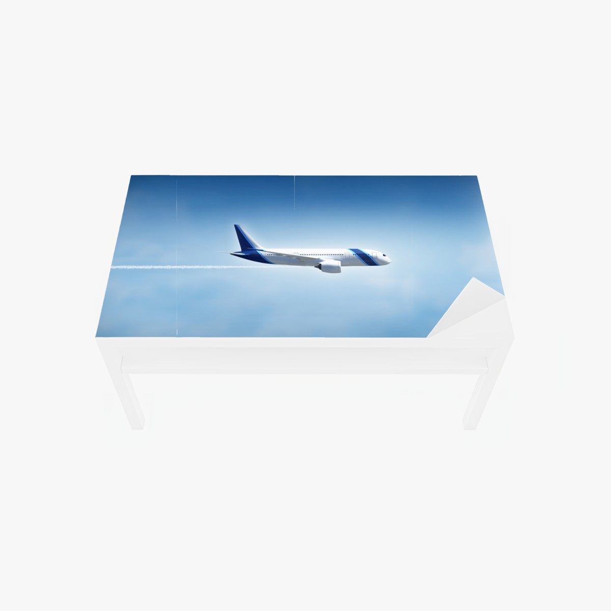 Table & desk veneer jetliner in clear blue sky