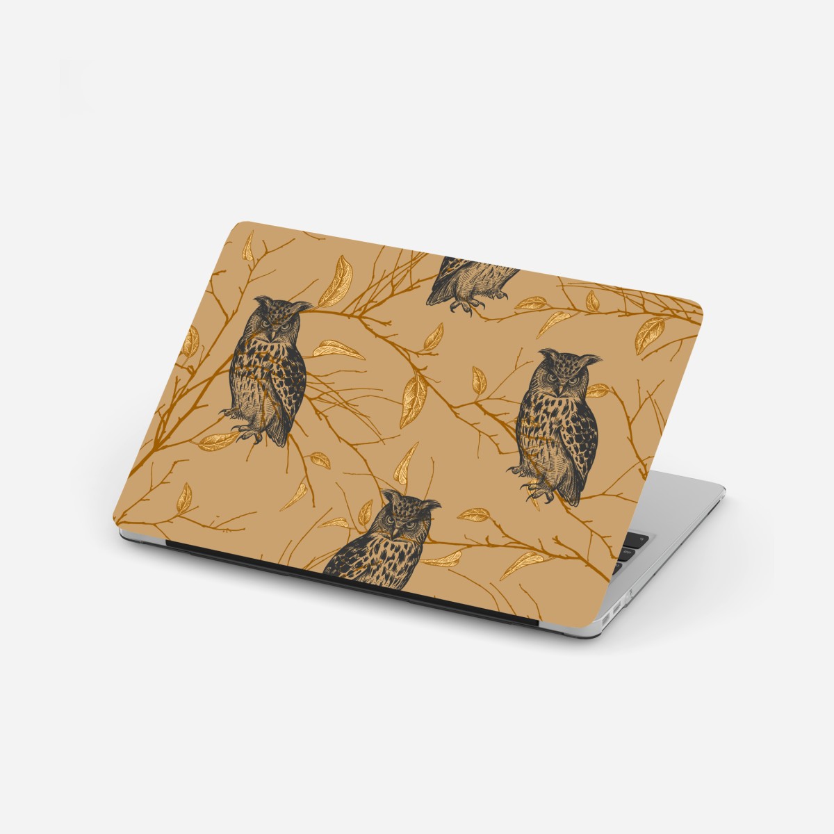 Laptop sticker golden owl pattern on beige background